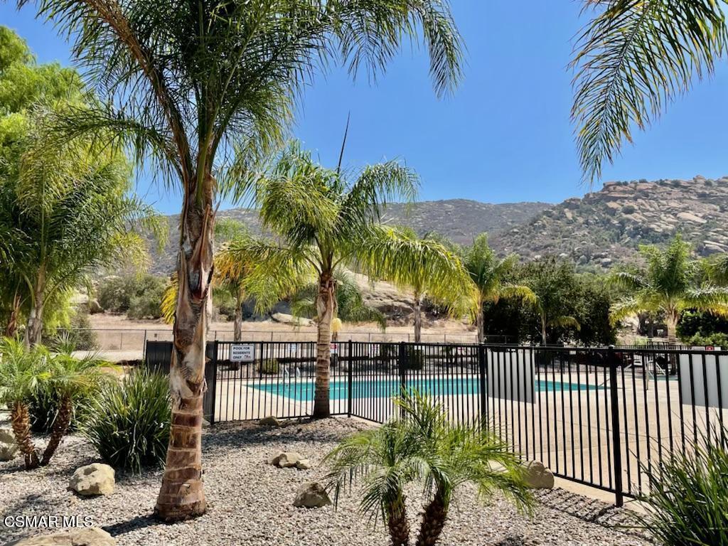 6480 Katherine Road, Unit 44 Simi Valley, CA 93063 - Photo 2 of 32 a view of a wrought iron iron fence