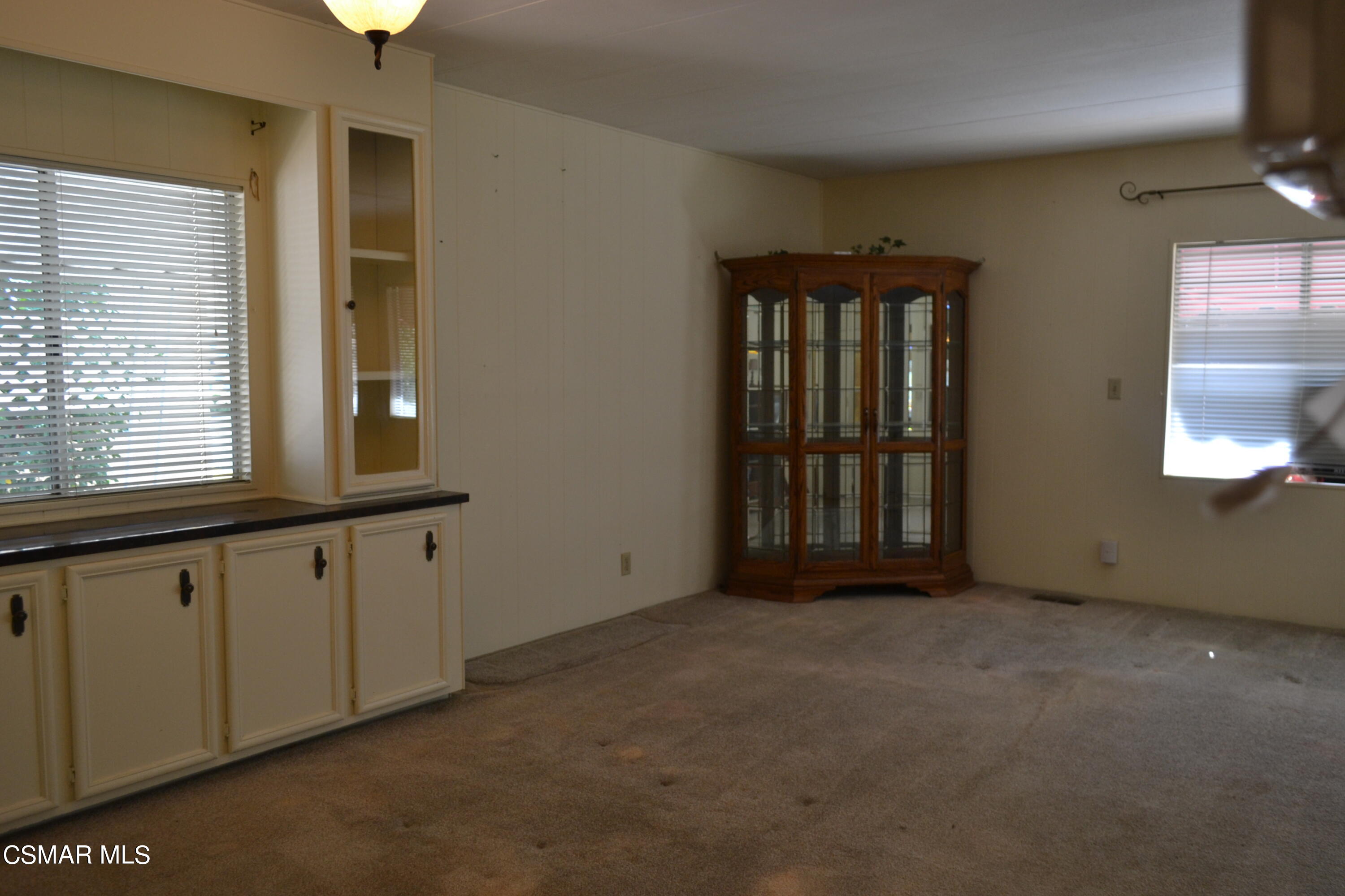 6480 Katherine Road, Unit 44 Simi Valley, CA 93063 - Photo 10 of 32 an empty room with windows