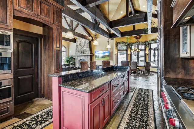 a spacious bathroom with a tub a mirror and shower