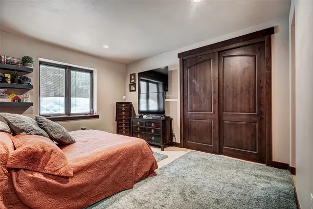 a view of a town with mountains in the background