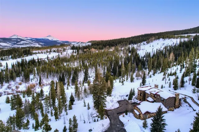 a swimming pool with outdoor seating and yard