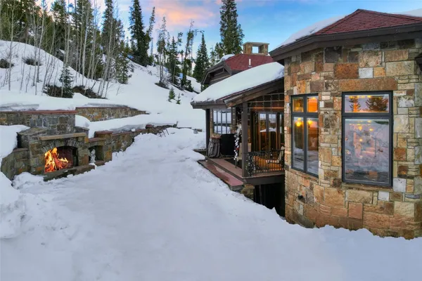 a view of a house with tub and trees
