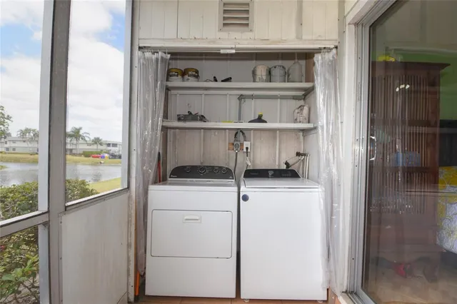a utility room with dryer and washer