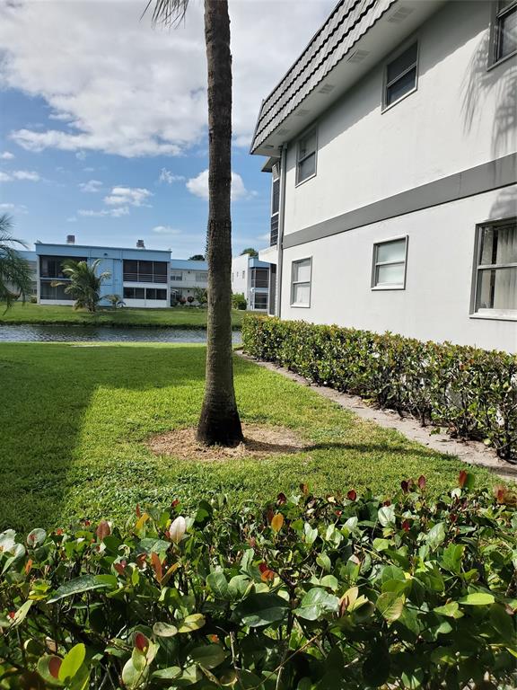 357 Saxony Lane, Unit 357 Delray Beach, FL 33446 - Photo 35 of 35 a view of a house with a big yard