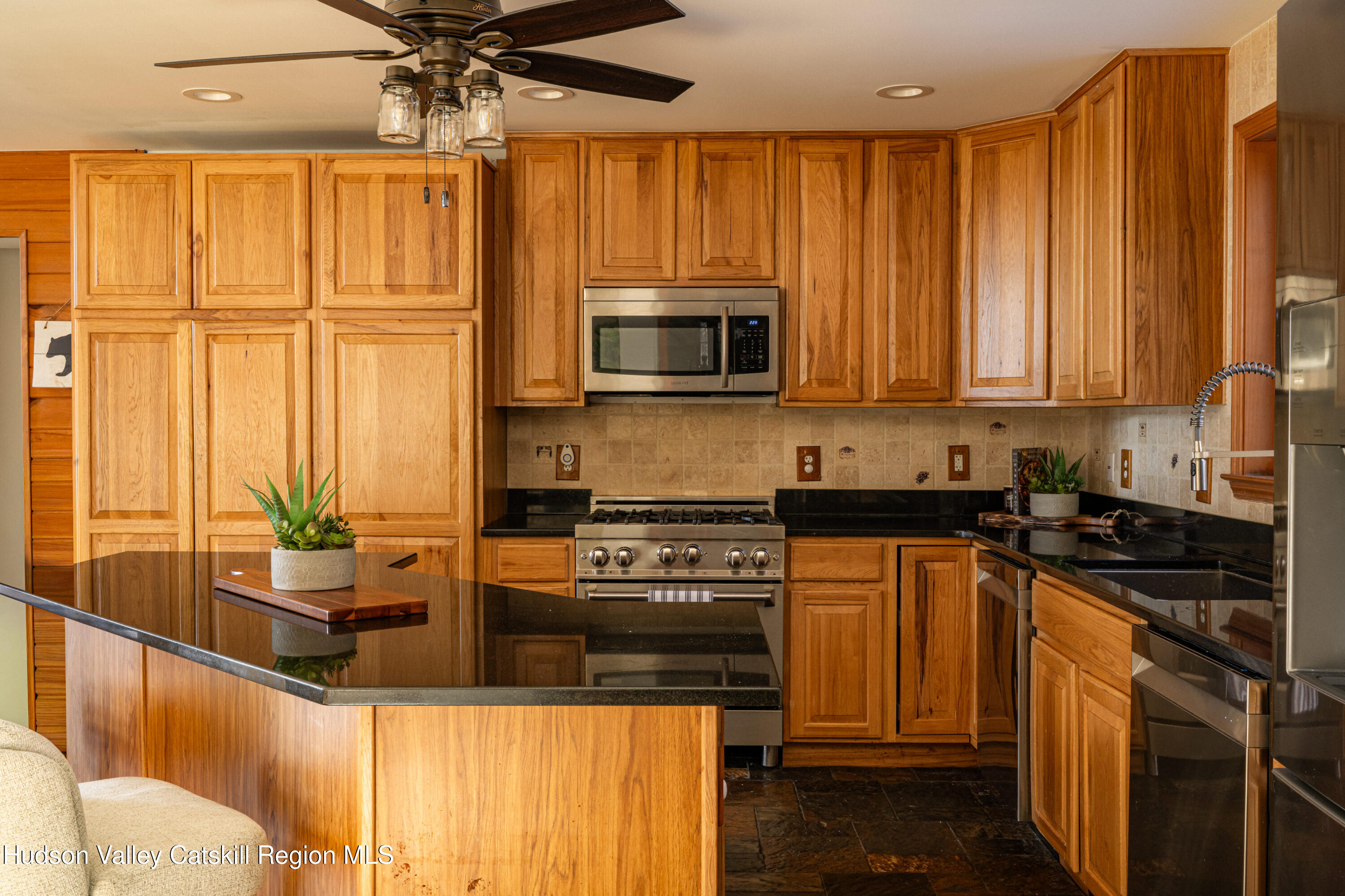37 Notch View Road Lexington, NY 12468 - Photo 11 of 71 a kitchen with a stove a sink and cabinets