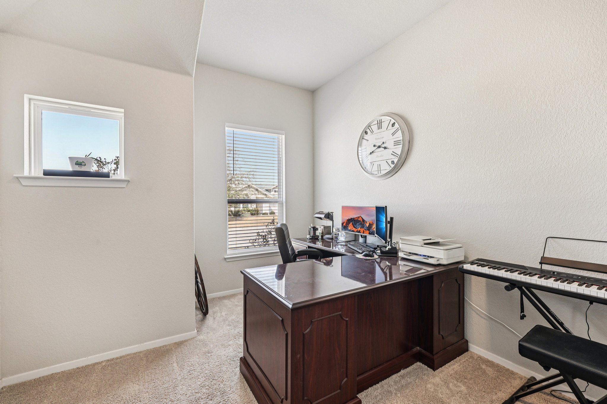 111 Insider Loop Elgin, TX 78621 - Photo 31 of 39 a view of a workspace with furniture