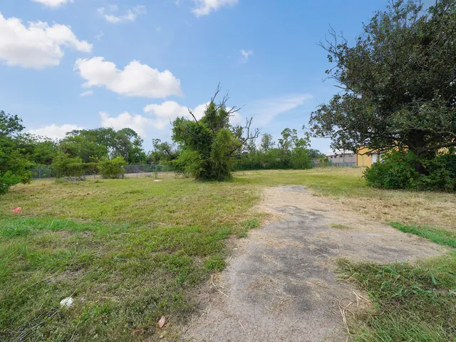 a view of a lake with a big yard
