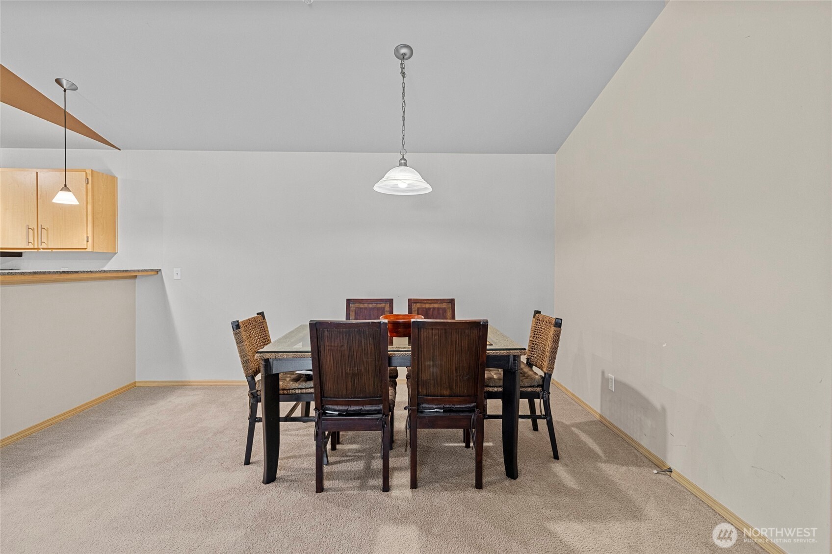 10709 Valley View Road, Unit B403 Bothell, WA 98011 - Photo 11 of 32 a view of a dining room with furniture