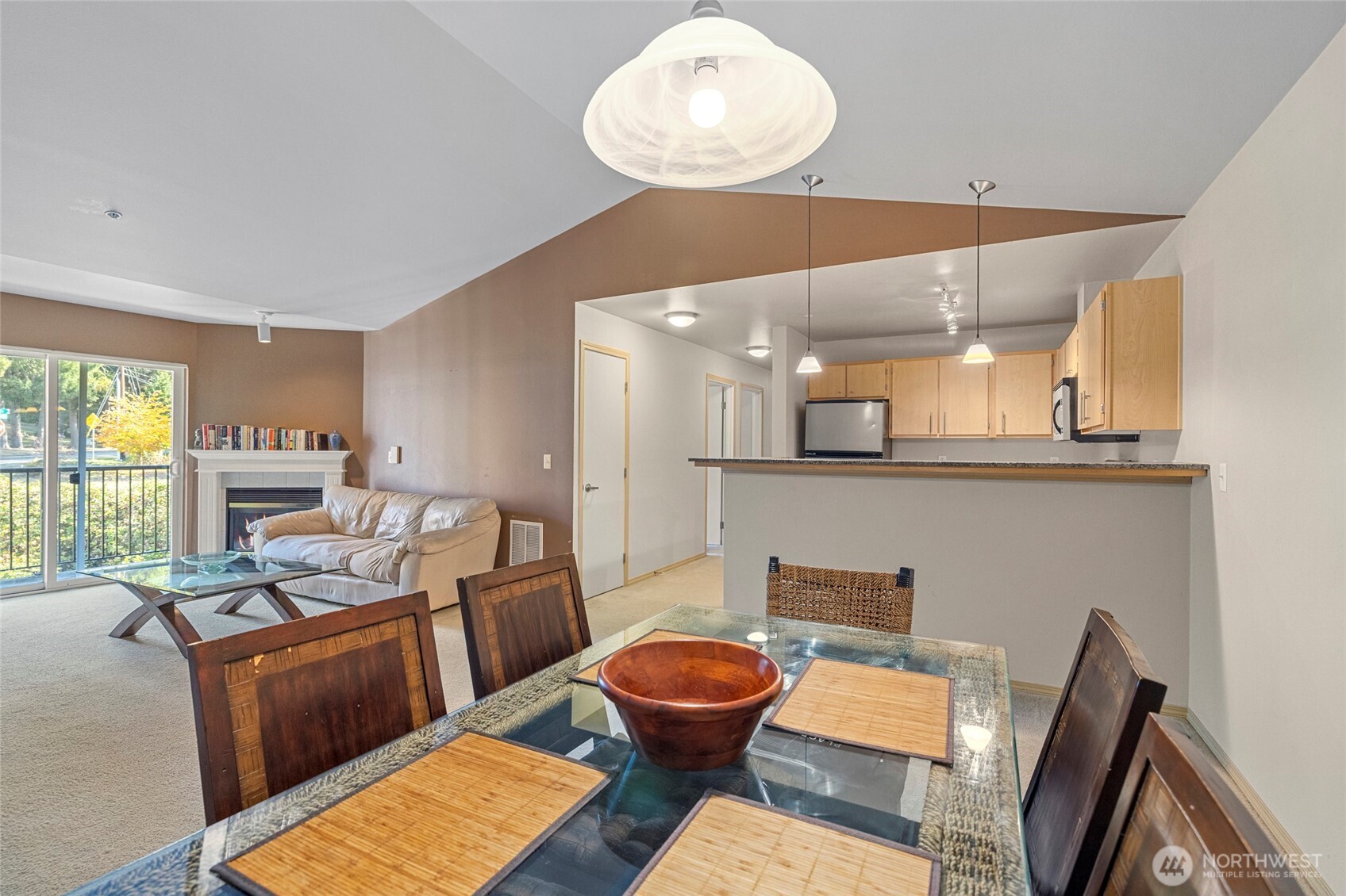 10709 Valley View Road, Unit B403 Bothell, WA 98011 - Photo 12 of 32 a living room with furniture and a large window