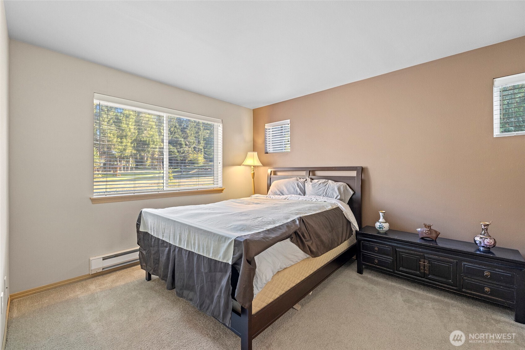 10709 Valley View Road, Unit B403 Bothell, WA 98011 - Photo 22 of 32 a bedroom with a bed and window