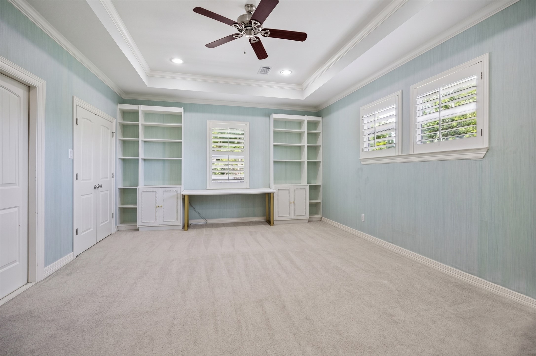 5121 Libbey Drive Houston, TX 77092 - Photo 13 of 24 Incredibly spacious secondary bedroom with built-in shelves, tray ceiling, recessed lighting, and Plantation shutters.
