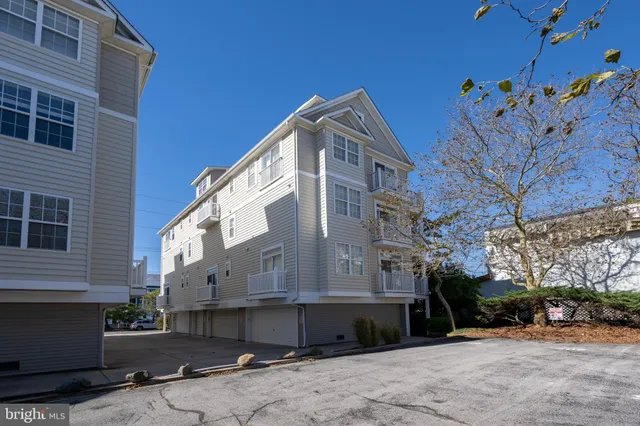 a view of street along with residential buildings