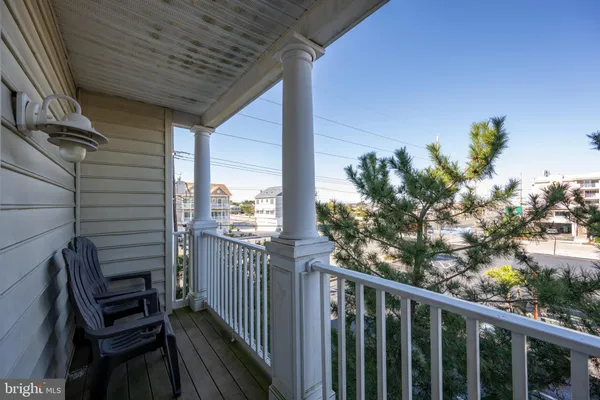 a view of a balcony with an outdoor space