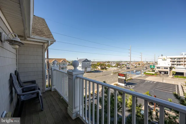 a view of balcony with furniture