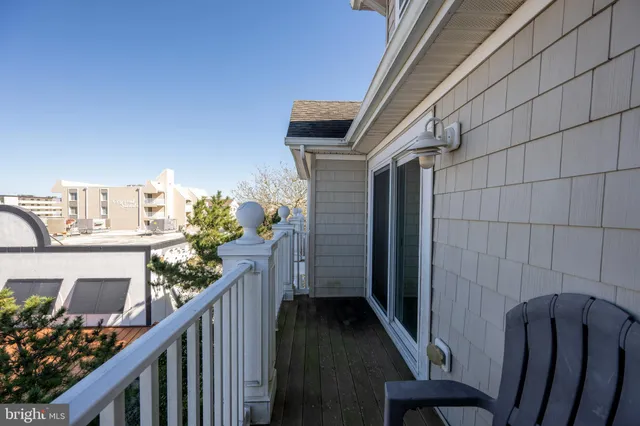 a view of balcony with furniture