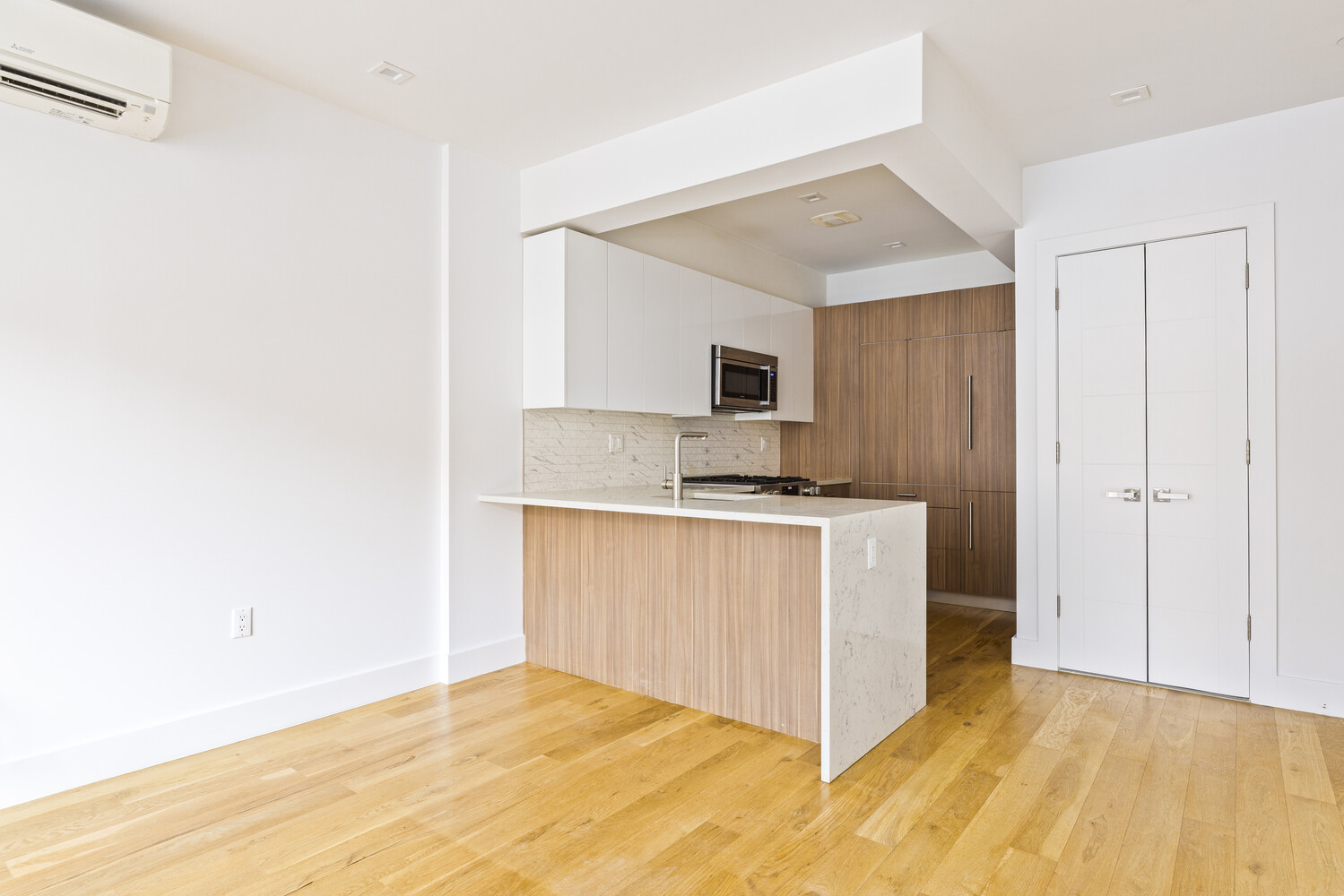 838 Quincy Street, Unit 2F Brooklyn, NY 11221 - Photo 5 of 8 a view of kitchen with granite countertop cabinets and sink