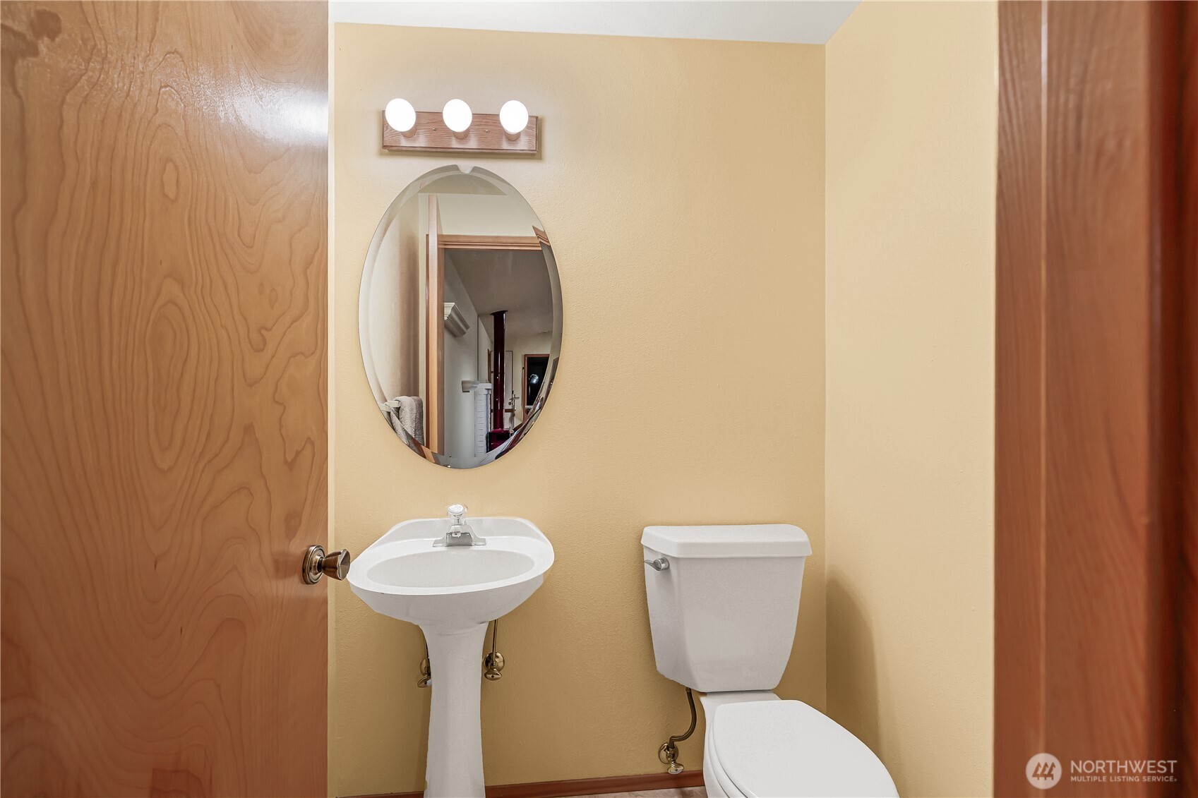 5161 Red Bridge Road Cle Elum, WA 98922 - Photo 14 of 40 a bathroom with a toilet sink and mirror