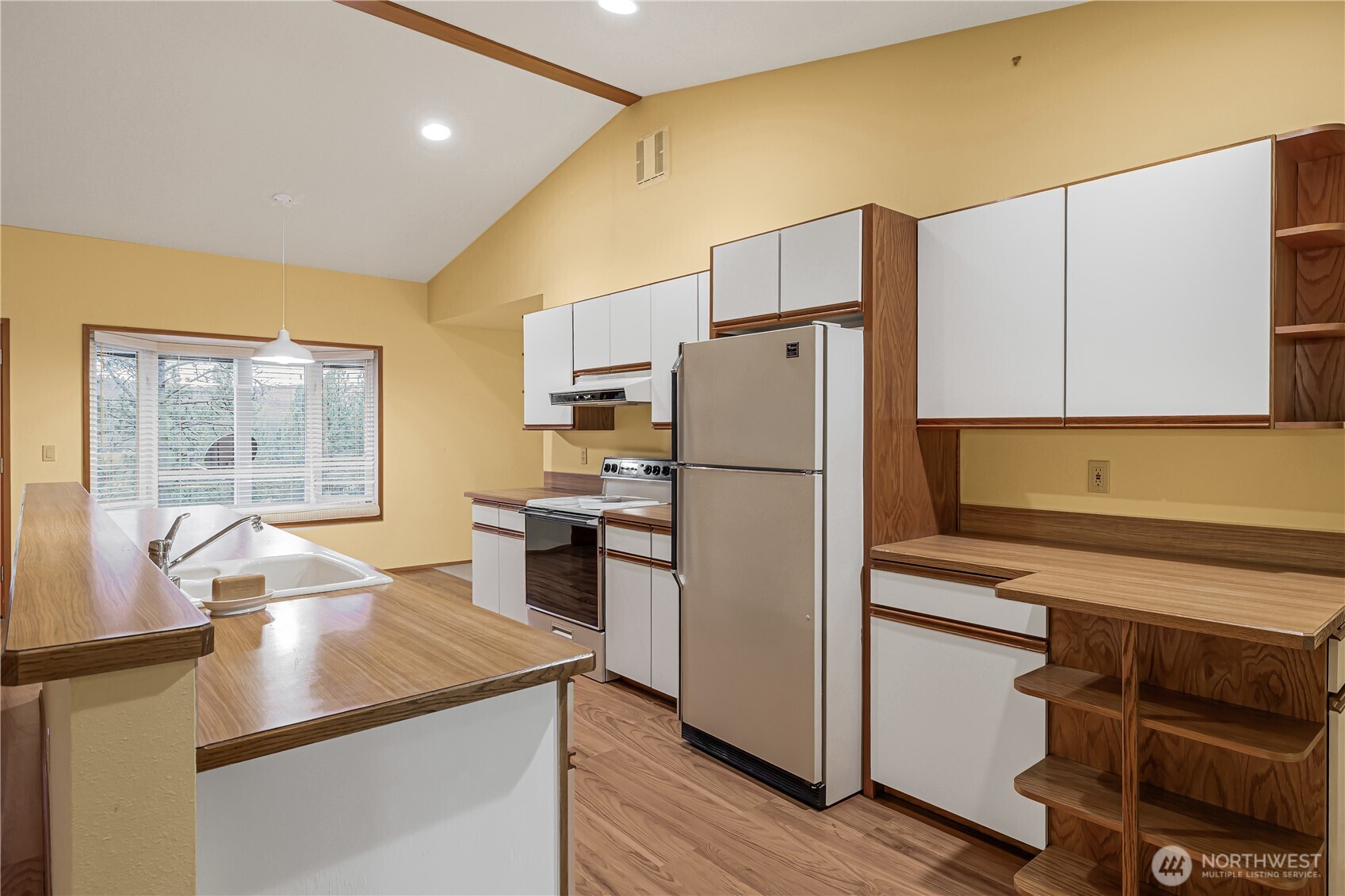 5161 Red Bridge Road Cle Elum, WA 98922 - Photo 21 of 40 a kitchen with a refrigerator a stove and a sink