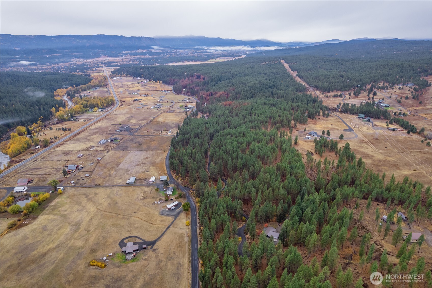 5161 Red Bridge Road Cle Elum, WA 98922 - Photo 34 of 40 an aerial view of residential house and sandy dunes