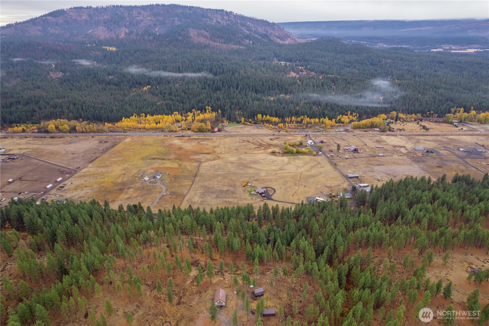 5161 Red Bridge Road Cle Elum, WA 98922 - Photo 40 of 40 a view of a lake with mountains in the background