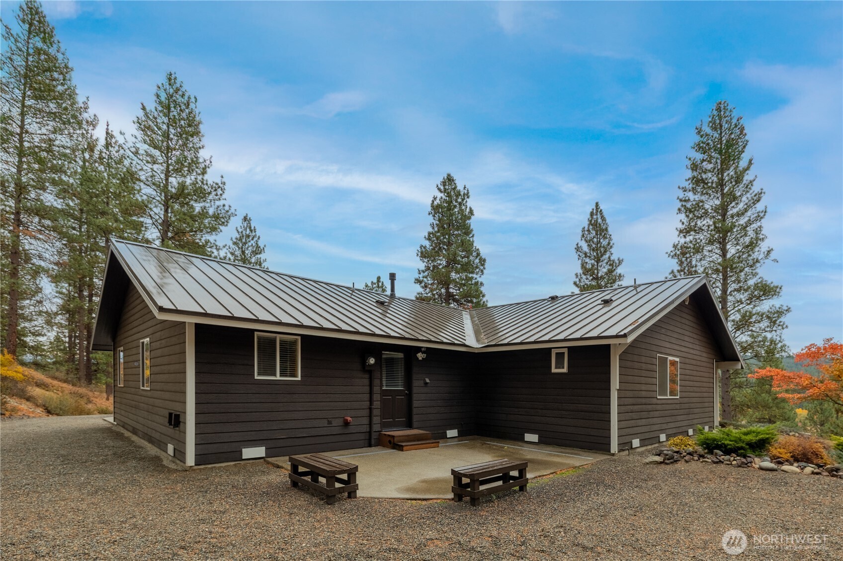 5161 Red Bridge Road Cle Elum, WA 98922 - Photo 5 of 40 a front view of a house with parking space