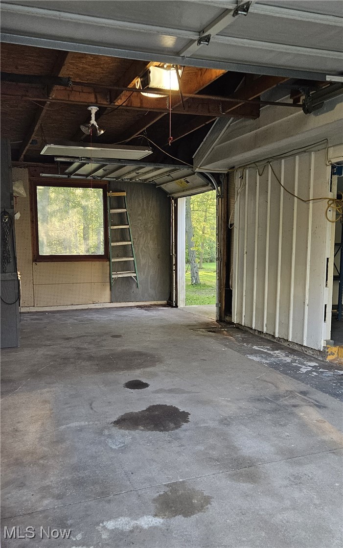 7836 Beach Road Wadsworth, OH 44281 - Photo 20 of 22 Garage bay 1 with back pass-thru door and garage opener