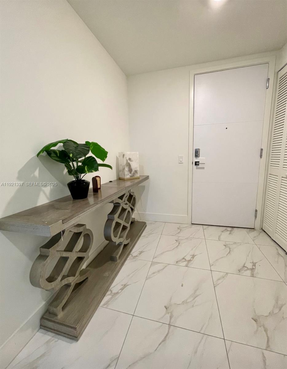 2000 Metropica Way, Unit 1009 Sunrise, FL 33323 - Photo 28 of 40 a view of a room with gym equipment