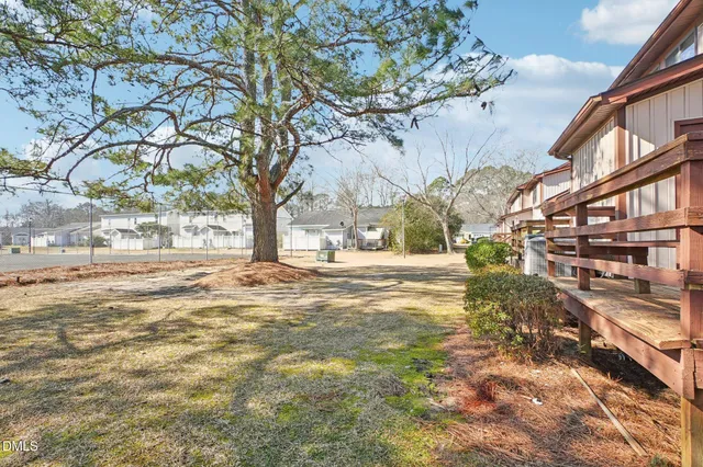 a view of yard with tree