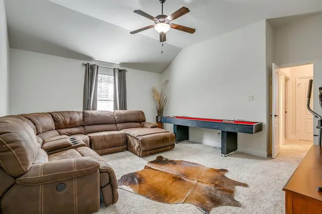 a bathroom with a sink a light fixture and a mirror