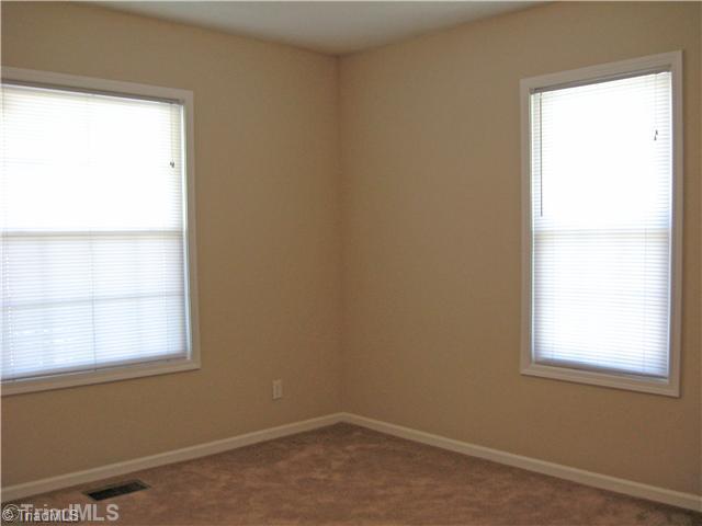 2907 West English Road High Point, NC 27262 - Photo 12 of 16 3rd Bedroom. Lots of light with two windows . . .At the front of the house, just off the Living Room.