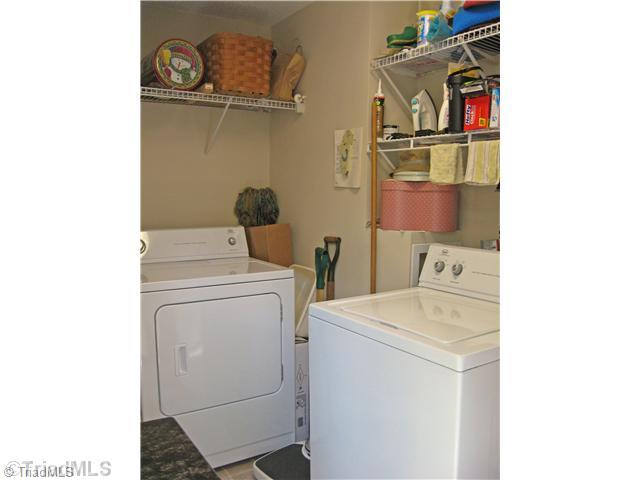2907 West English Road High Point, NC 27262 - Photo 14 of 16 Laundry Room. Storage and Laundry area . . .10 3" x 5 3" . Washer and Dryer Stay!!!! Access to back yard thru this area.
