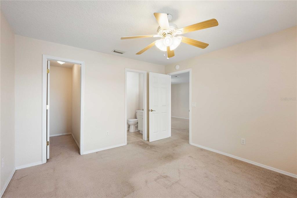 2982 Cr 756a Webster Webster, FL 33597 - Photo 25 of 26 an empty room with a fan and a fan