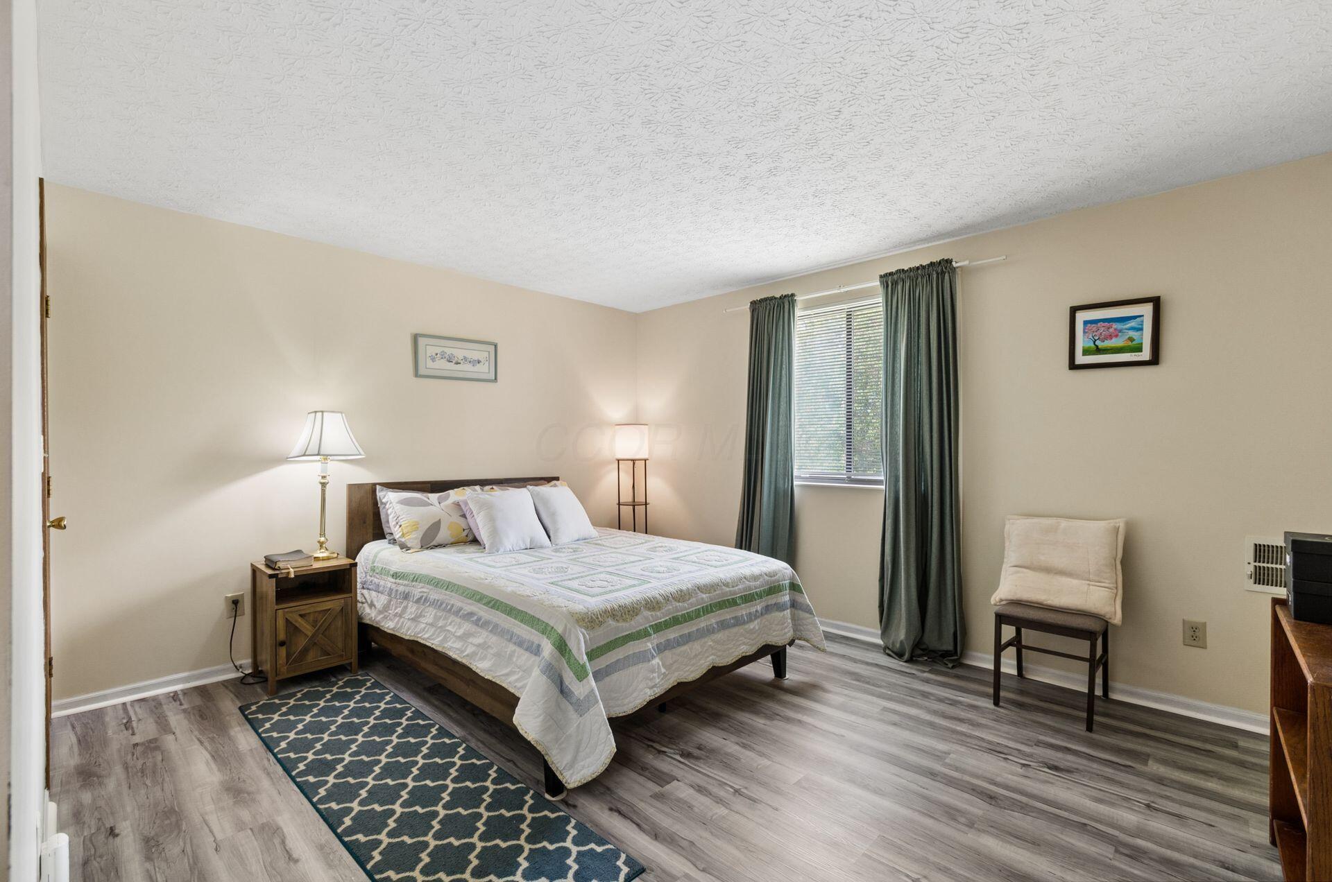 5885 Beechcroft Road, Unit 302 Columbus, OH 43229 - Photo 13 of 31 Primary Bedroom