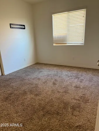 a view of a room that has a window in it