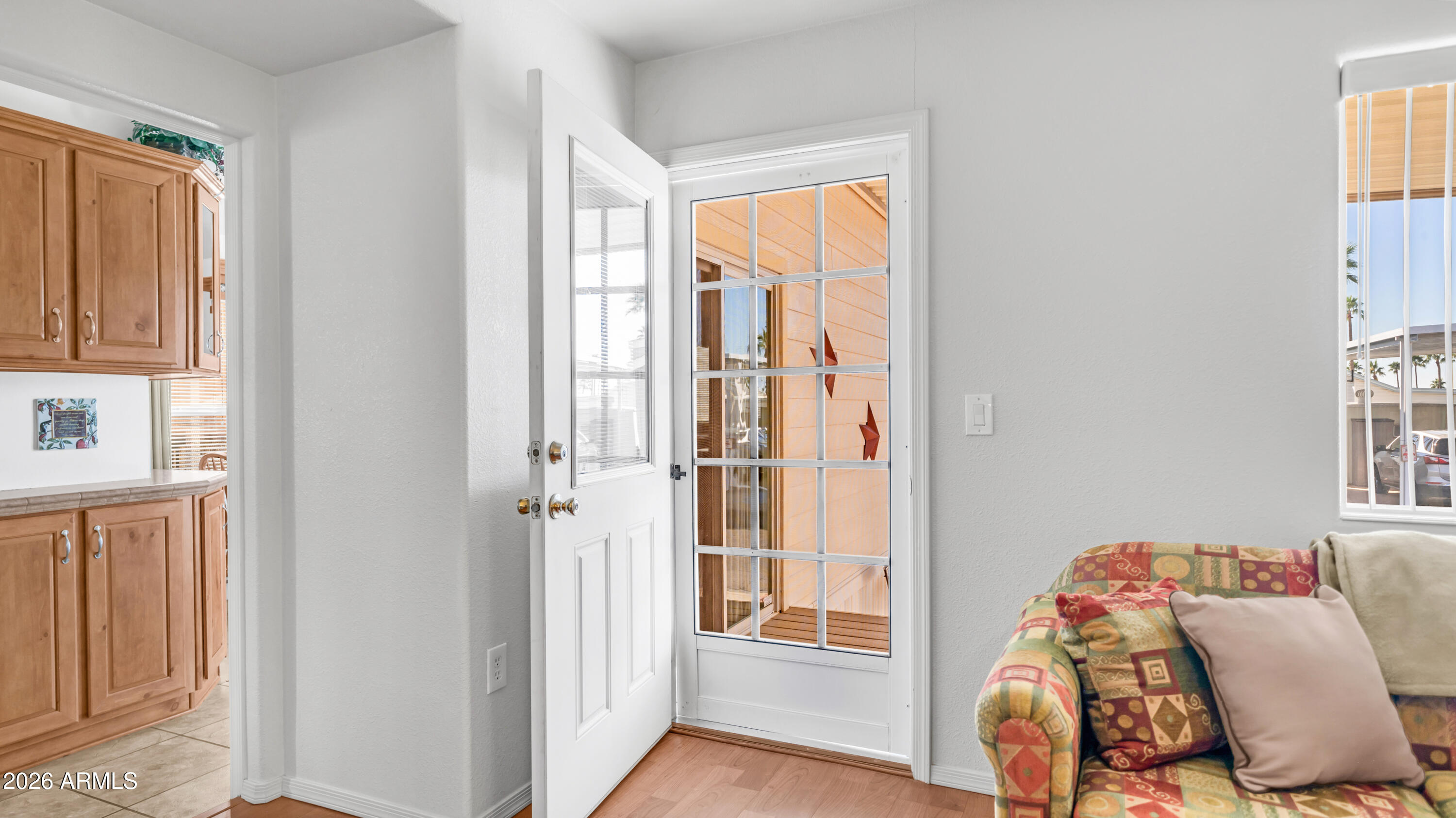 3710 South Goldfield Road, Unit 721 Apache Junction, AZ 85119 - Photo 24 of 63 a view of a livingroom with furniture and a window