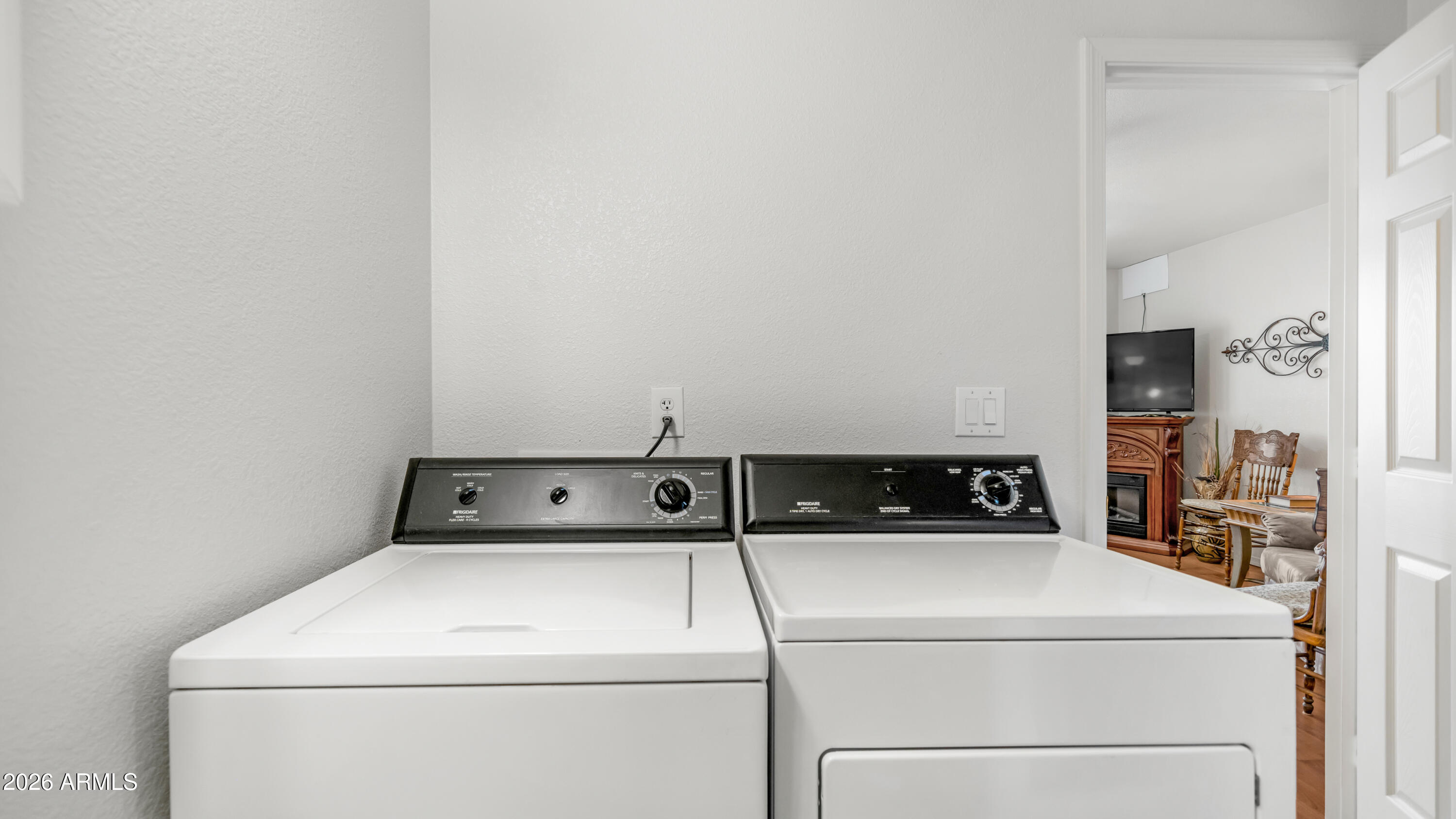 3710 South Goldfield Road, Unit 721 Apache Junction, AZ 85119 - Photo 27 of 63 a close up view of washer and dryer