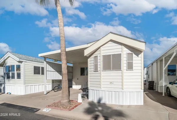 a front view of a house with a garage