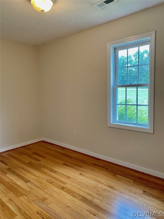 684 Bowlers Road Center Cross, VA 22437 - Photo 15 of 25 Bedroom with lovely hardwood floors.