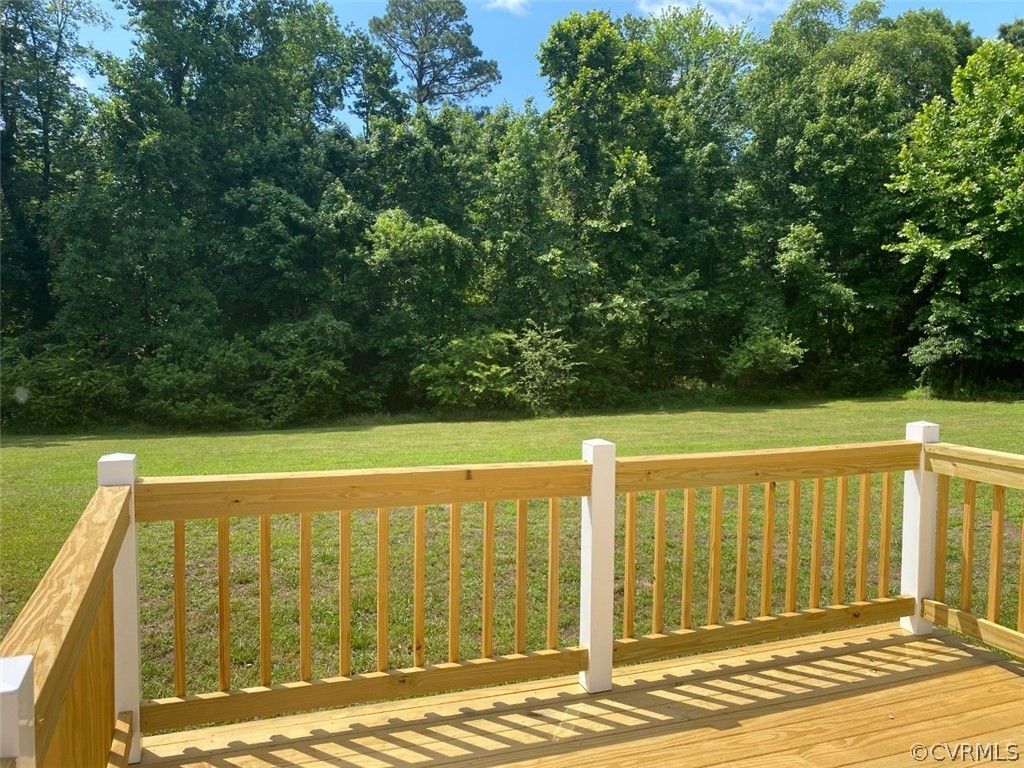 684 Bowlers Road Center Cross, VA 22437 - Photo 22 of 25 New rear deck with view of big rear yard.