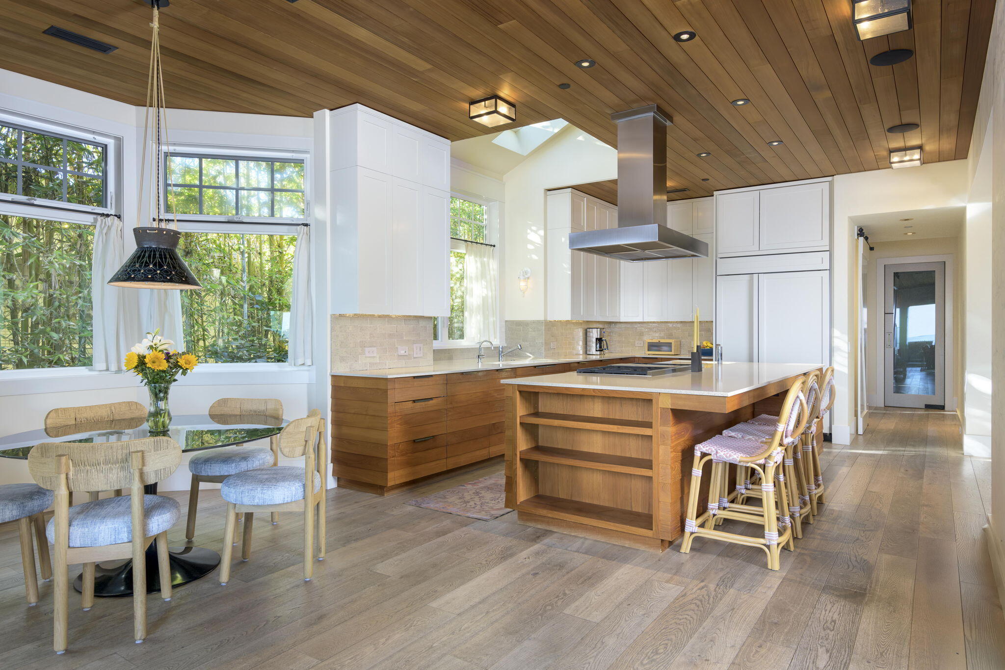 8096 Puesta Del Sol Carpinteria, CA 93013 - Photo 12 of 38 a kitchen with a table chairs stove and cabinets