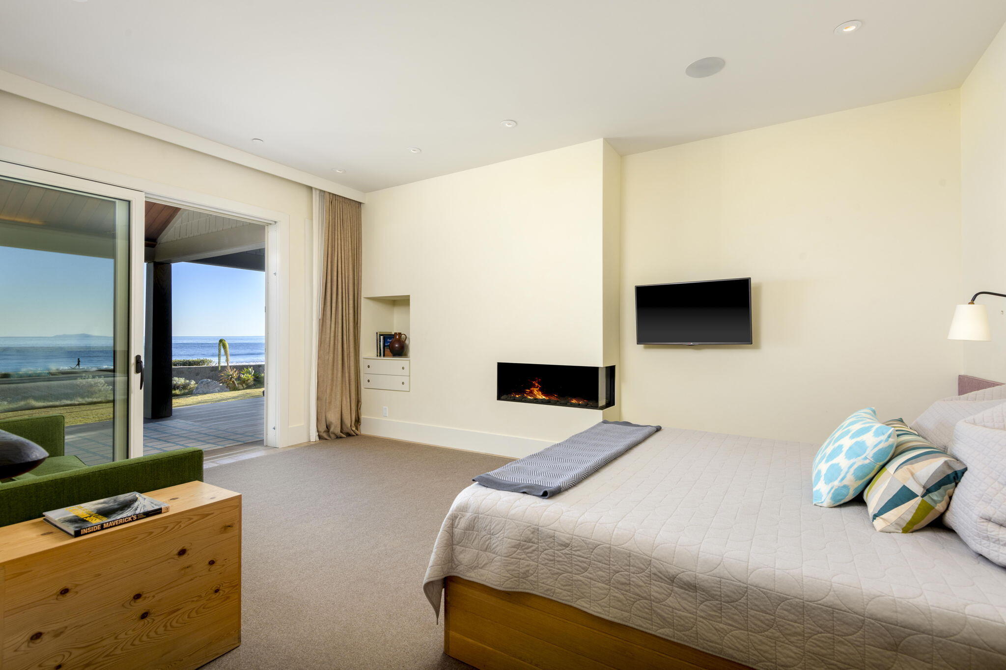 8096 Puesta Del Sol Carpinteria, CA 93013 - Photo 17 of 38 a bedroom with a bed and flat screen tv