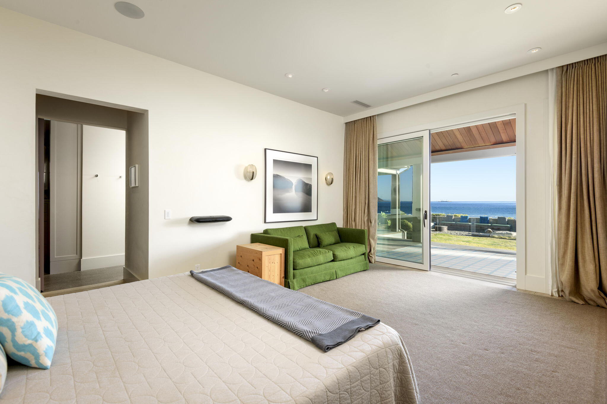 8096 Puesta Del Sol Carpinteria, CA 93013 - Photo 18 of 38 a bedroom with a bed and a couch