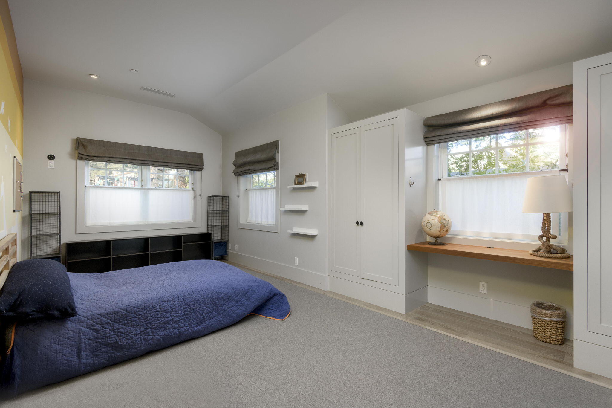 8096 Puesta Del Sol Carpinteria, CA 93013 - Photo 23 of 38 a living room with a bed furniture and a large window