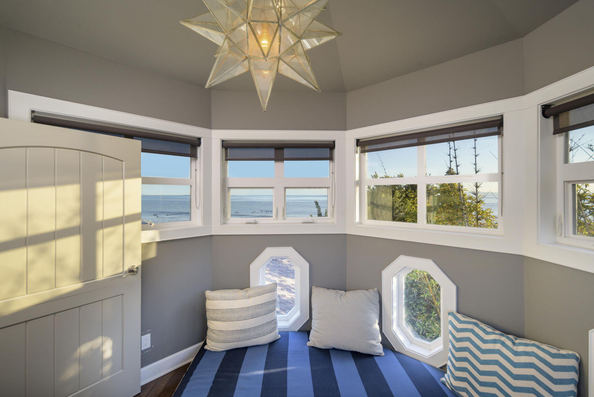 8096 Puesta Del Sol Carpinteria, CA 93013 - Photo 29 of 38 a living room with wooden floor and furniture