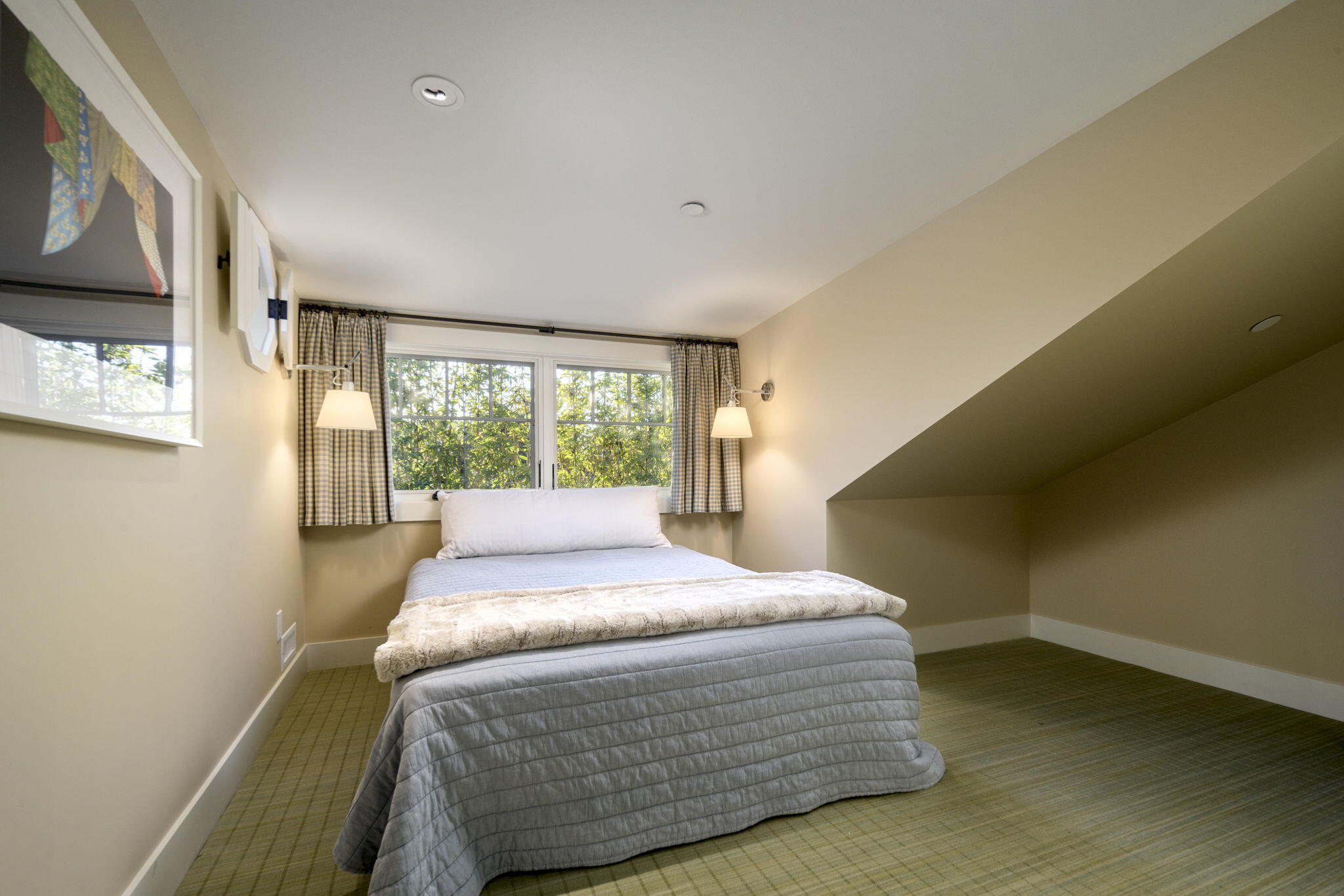 8096 Puesta Del Sol Carpinteria, CA 93013 - Photo 30 of 38 a bedroom with a bed and a large window