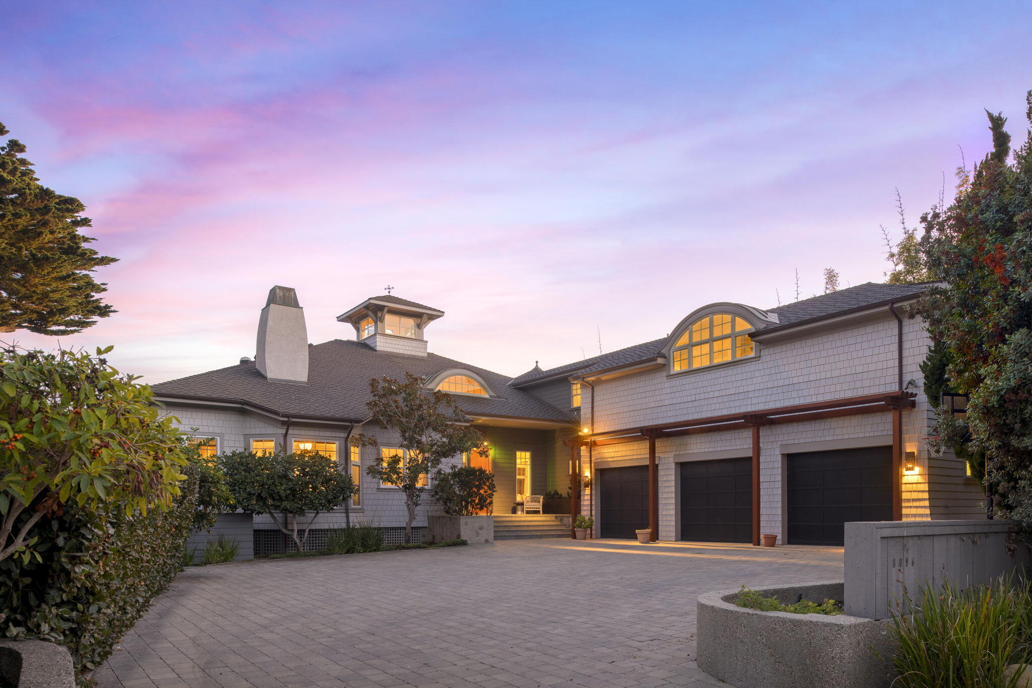8096 Puesta Del Sol Carpinteria, CA 93013 - Photo 5 of 38 a front view of a house with a garden