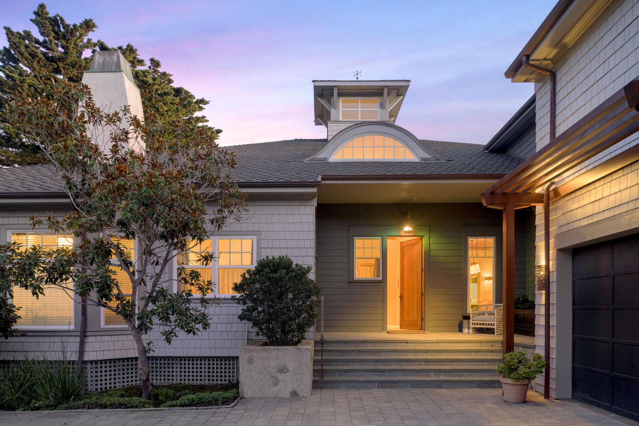 8096 Puesta Del Sol Carpinteria, CA 93013 - Photo 6 of 38 a front view of a house with a porch
