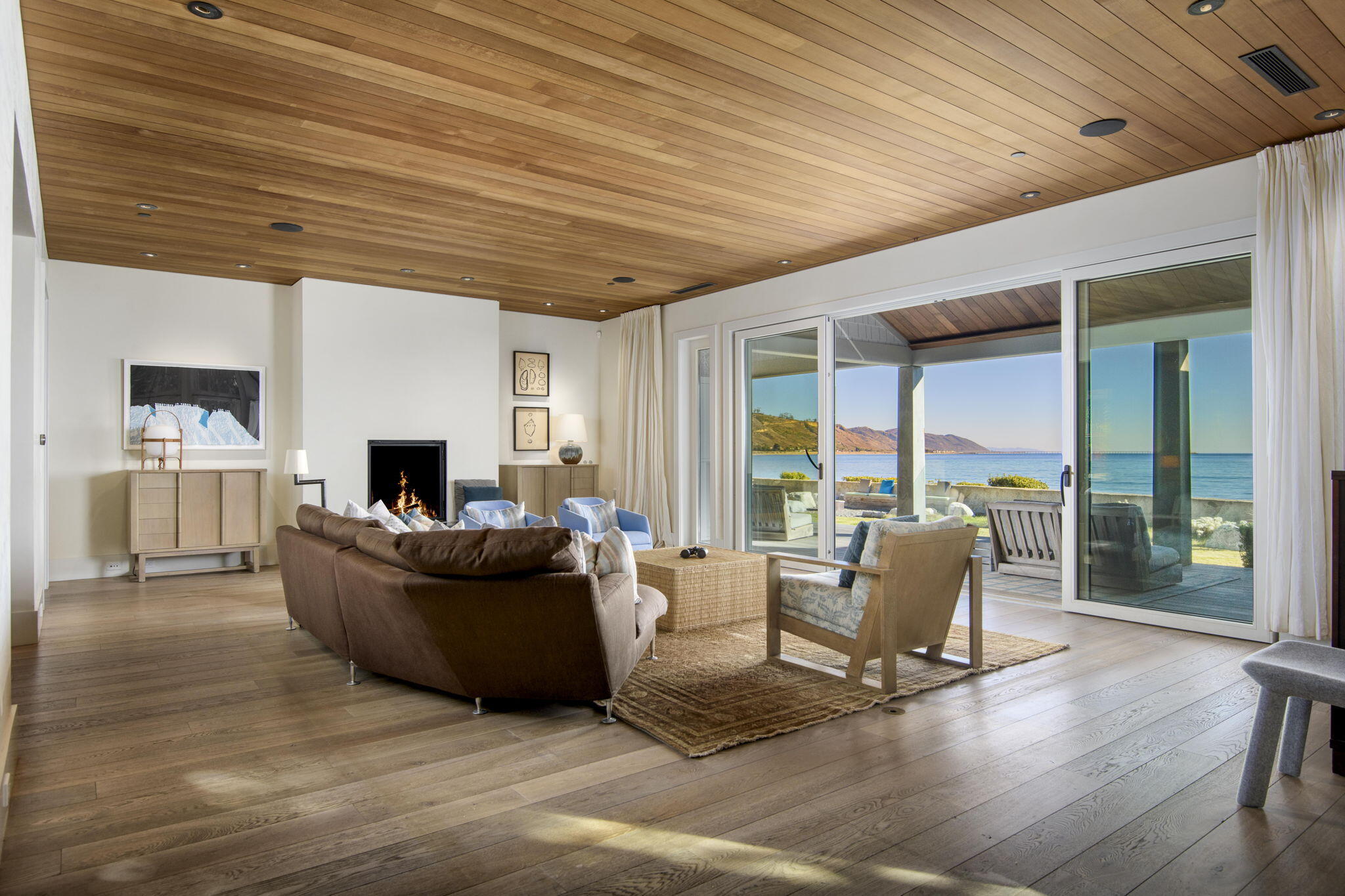 8096 Puesta Del Sol Carpinteria, CA 93013 - Photo 8 of 38 a living room with furniture and a large window