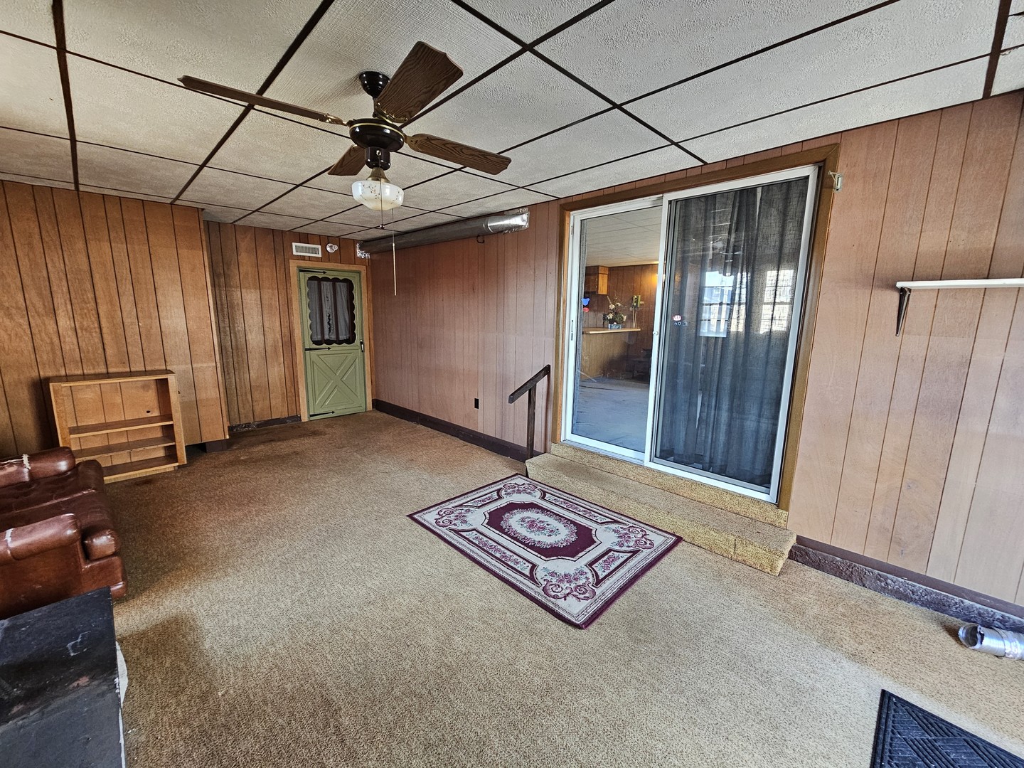 607 South Broadway Street Waltonville, IL 62894 - Photo 16 of 23 a living room with furniture and a window