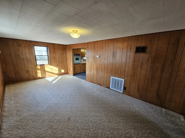 a view of a livingroom with a staircase